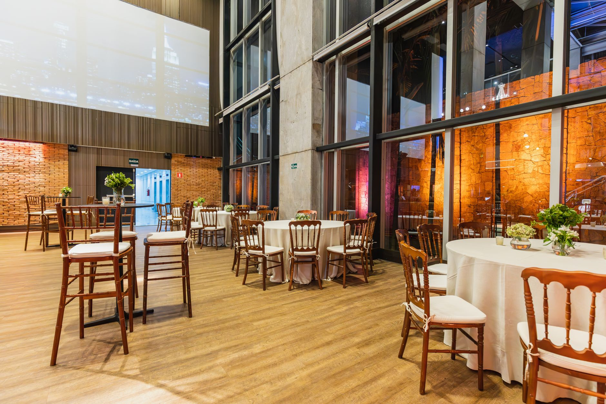 Adults celebrating around a casino-themed table in a warmly lit private loft